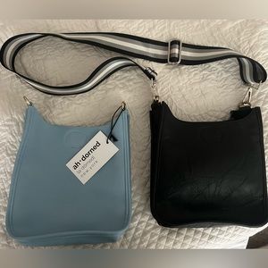 Two leather crossbody bag (black and light blue) with black/white stripe strap